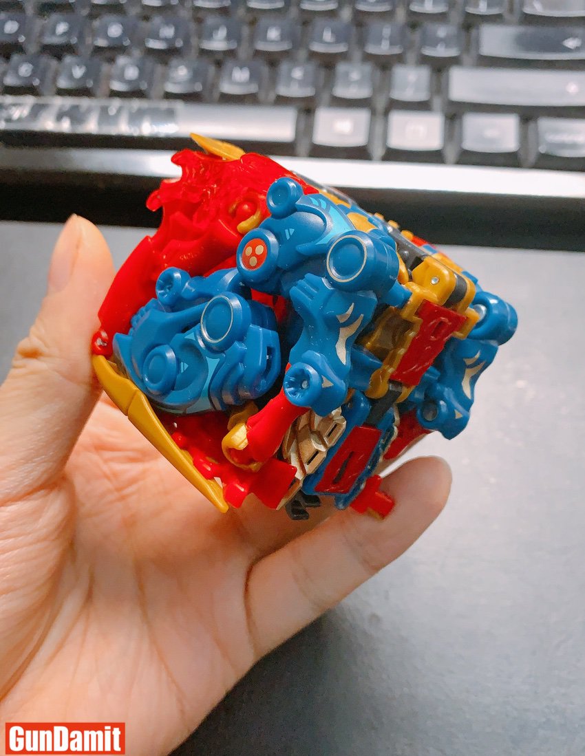 52Toys Megabox MB-22 Kilin in cube form held in hand showing compact transformation design 52Toys Megabox MB-22 Kilin in cube form held in hand showing compact transformation design