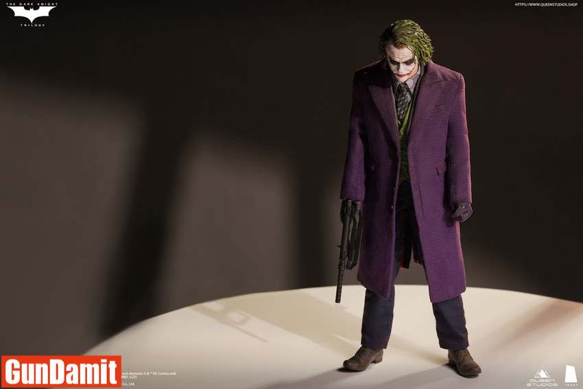 Inart 1/6 Dark Knight Joker standing on spotlight holding shotgun in purple coat Inart 1/6 Dark Knight Joker standing on spotlight holding shotgun in purple coat