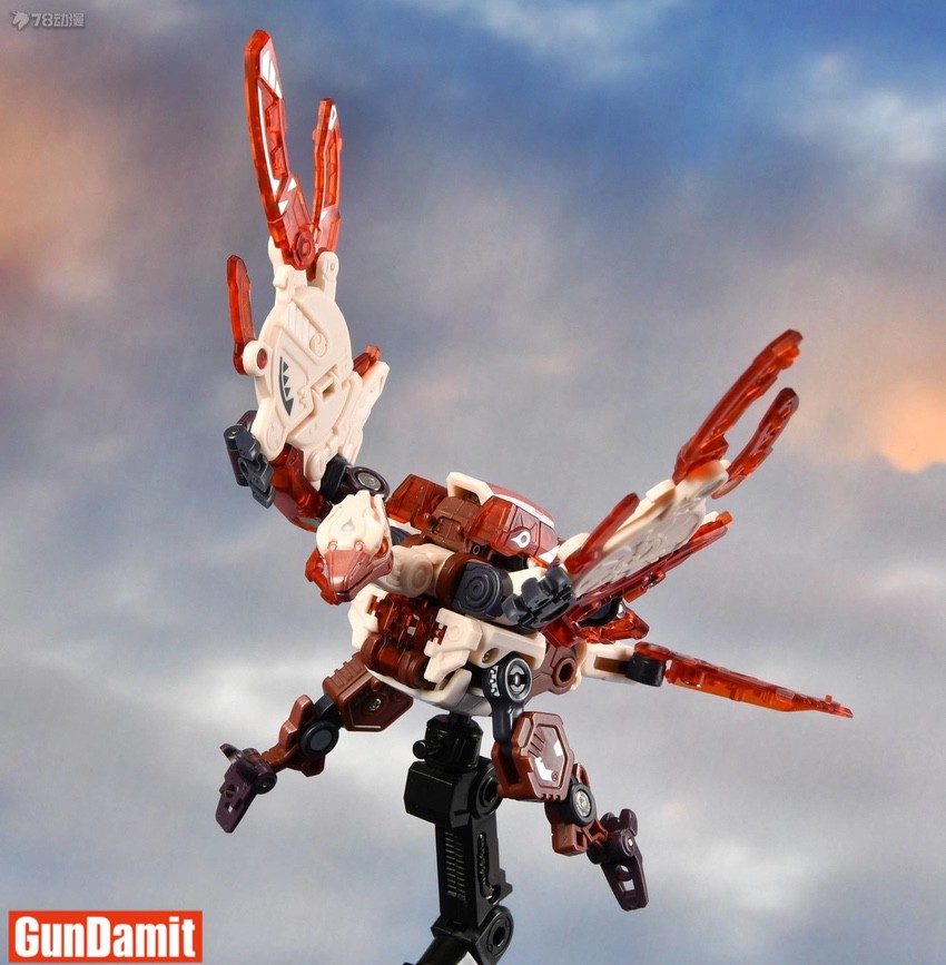 52Toys BB-45 Stratosphere flying pose with translucent red wings extended upward 52Toys BB-45 Stratosphere flying pose with translucent red wings extended upward