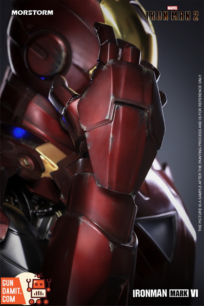 Iron Man Mark VI bust fist close-up showing battle-damaged metallic red armor paint weathering Iron Man Mark VI bust fist close-up showing battle-damaged metallic red armor paint weathering