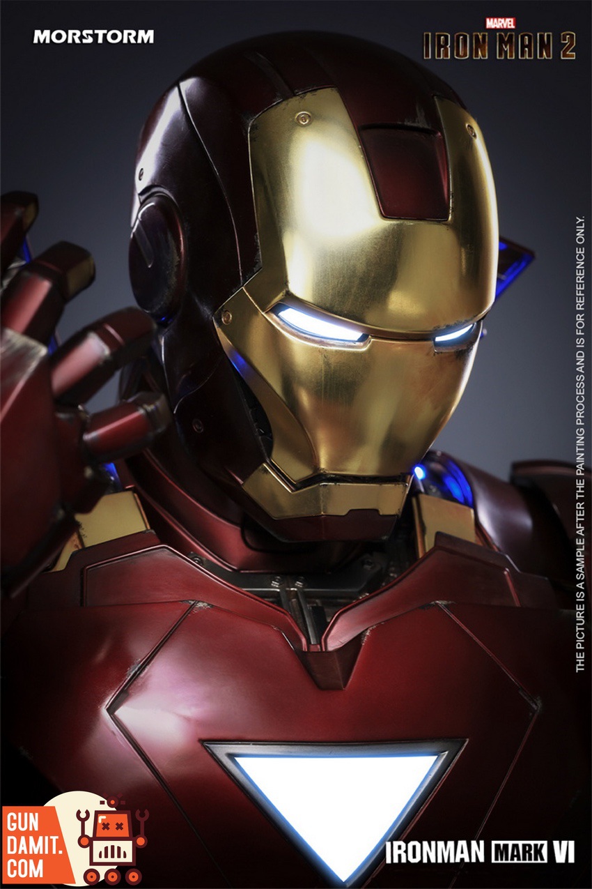 Iron Man Mark VI bust statue head close-up with illuminated eyes and gold faceplate detail Iron Man Mark VI bust statue head close-up with illuminated eyes and gold faceplate detail