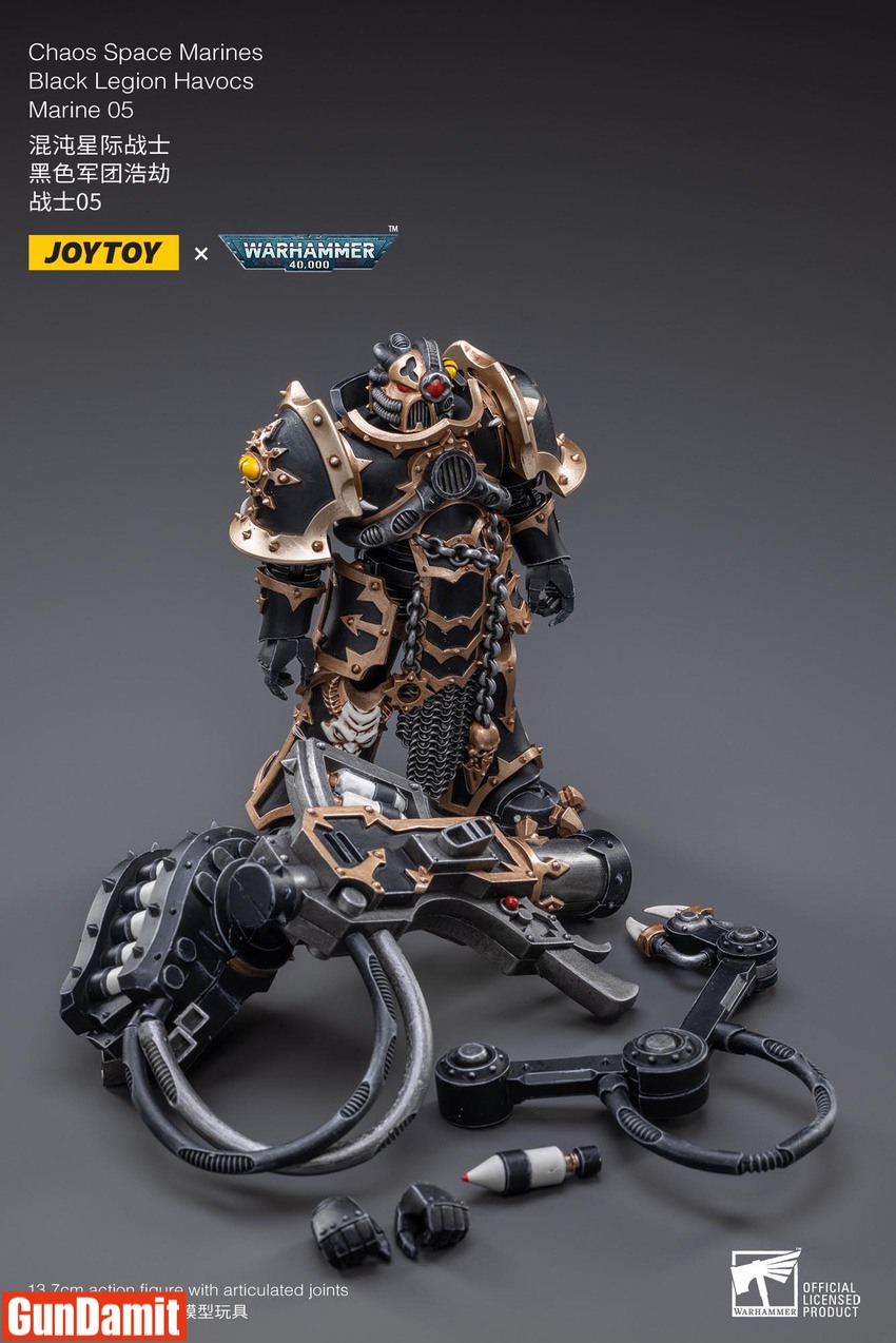 JoyToy Black Legion Havocs Marine 05 with accessories and detached servo arm parts displayed JoyToy Black Legion Havocs Marine 05 with accessories and detached servo arm parts displayed