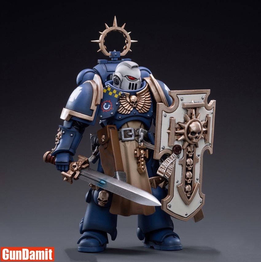 JoyToy WH40K Ultramarines Bladeguard Veteran 03 front view with sword and shield JoyToy WH40K Ultramarines Bladeguard Veteran 03 front view with sword and shield