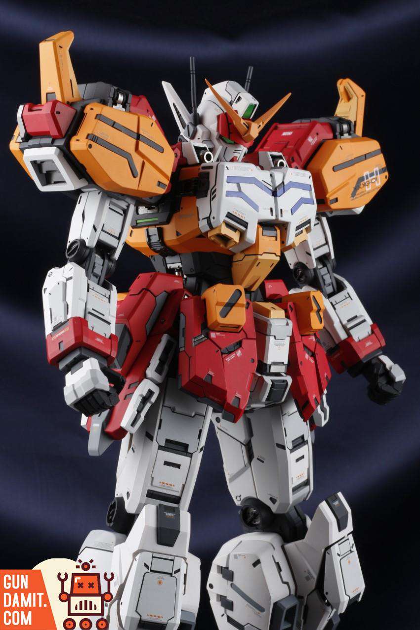 Close-up upper body view of SH Studio HeavyArms EW showing head sculpt and chest missile bay detail Close-up upper body view of SH Studio HeavyArms EW showing head sculpt and chest missile bay detail