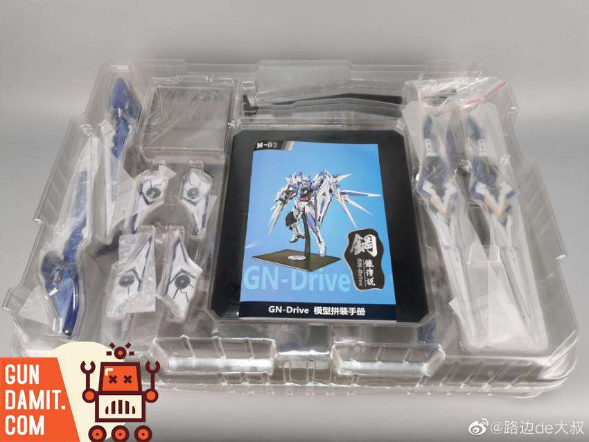 Steel Legend Gundam Amazing Exia unboxing showing parts tray and instruction manual Steel Legend Gundam Amazing Exia unboxing showing parts tray and instruction manual