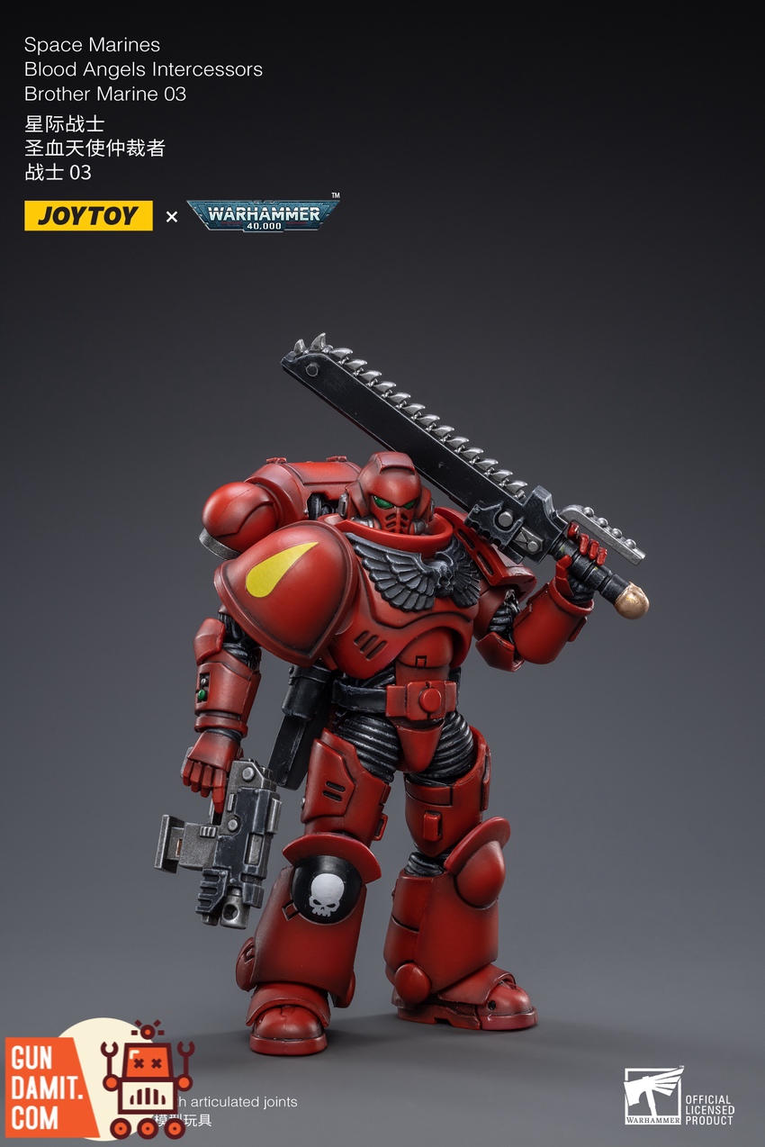 JoyToy Blood Angels Marine 03 with chainsword shoulder pose front view JoyToy Blood Angels Marine 03 with chainsword shoulder pose front view