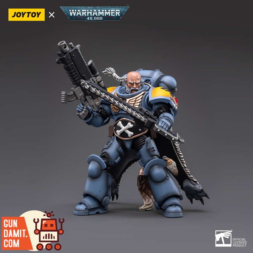 JoyToy 1/18 Space Wolves Brother Gunnar action figure holding bolter and chainsword front view JoyToy 1/18 Space Wolves Brother Gunnar action figure holding bolter and chainsword front view