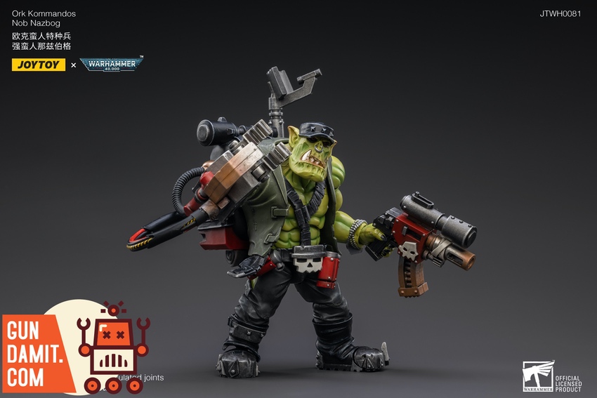 JoyToy Ork Kommandos Nob Nazbog three-quarter view showing weapon detail JoyToy Ork Kommandos Nob Nazbog three-quarter view showing weapon detail