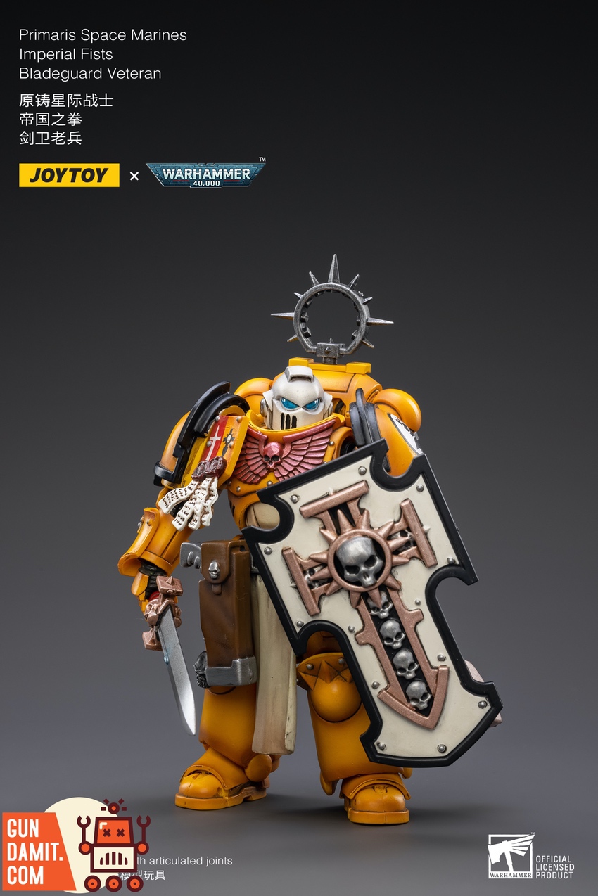 JoyToy Imperial Fists Bladeguard Veteran close-up front view with shield and purity seals JoyToy Imperial Fists Bladeguard Veteran close-up front view with shield and purity seals