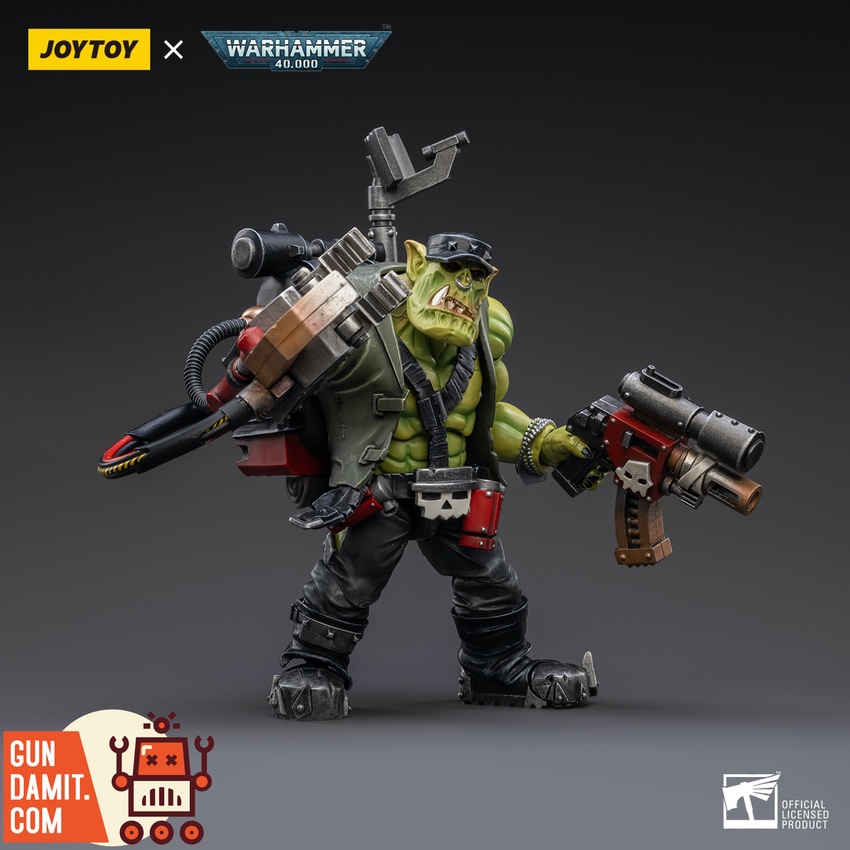 JoyToy Ork Kommandos Nob Nazbog front view with dual heavy weapons JoyToy Ork Kommandos Nob Nazbog front view with dual heavy weapons