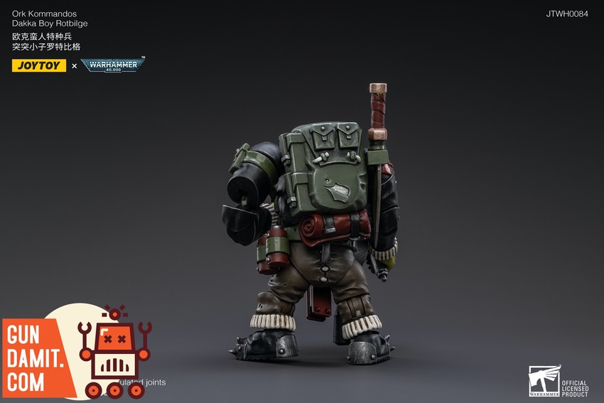 JoyToy Ork Kommandos Dakka Boy Rotbilge three-quarter view with heavy weapon JoyToy Ork Kommandos Dakka Boy Rotbilge three-quarter view with heavy weapon