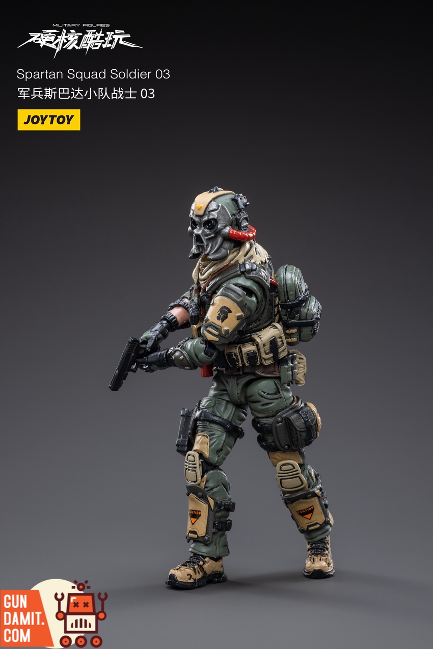 Spartan Squad 03 side view with skull mask and pistol drawn Spartan Squad 03 side view with skull mask and pistol drawn