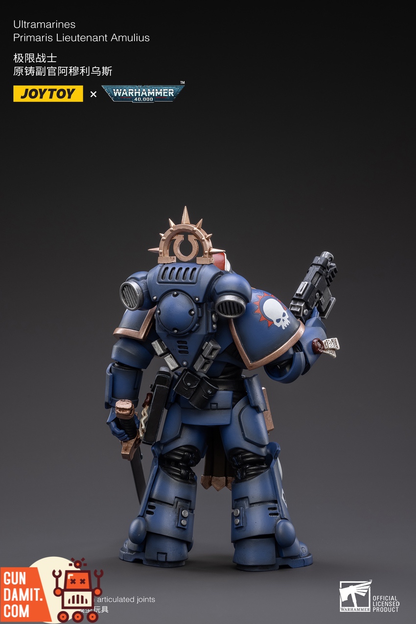 Primaris Lieutenant Amulius blue power armor with gold trim details Primaris Lieutenant Amulius blue power armor with gold trim details