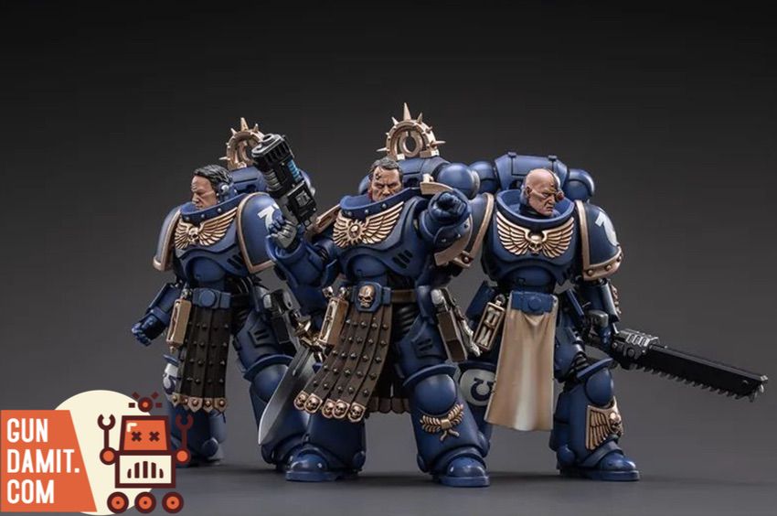 Three Ultramarines figures group shot showing different weapon loadouts Three Ultramarines figures group shot showing different weapon loadouts