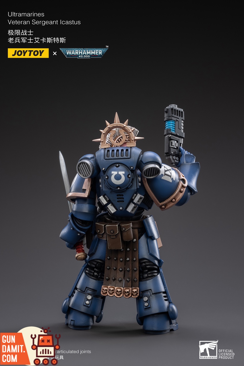 JoyToy Ultramarines Sergeant Icastus close-up showing Omega symbol and skulls detail JoyToy Ultramarines Sergeant Icastus close-up showing Omega symbol and skulls detail