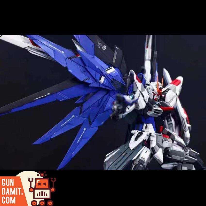 Infinite Dimension Freedom Gundam conversion kit close-up showing blue wing detail Infinite Dimension Freedom Gundam conversion kit close-up showing blue wing detail