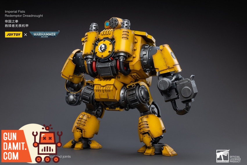 JoyToy 1/18 Imperial Fists Redemptor Dreadnought front view in yellow armor with gatling gun JoyToy 1/18 Imperial Fists Redemptor Dreadnought front view in yellow armor with gatling gun