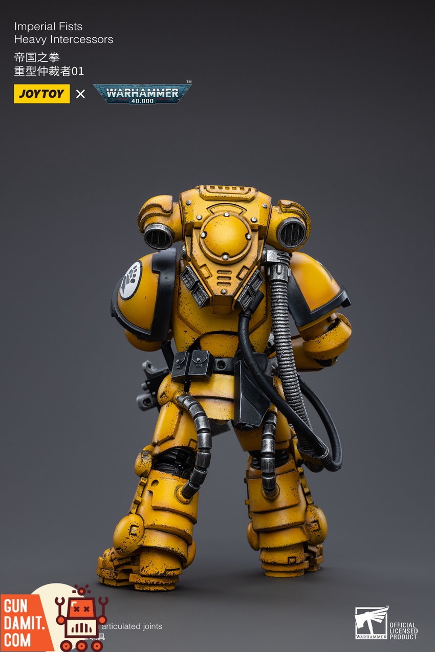 Imperial Fists Heavy Intercessors side profile showing Gravis armor bulk Imperial Fists Heavy Intercessors side profile showing Gravis armor bulk