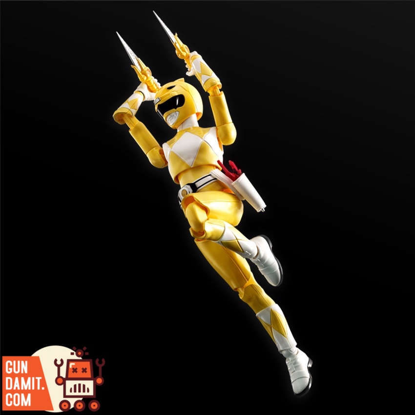 Flame Toys Furai Model Yellow Ranger action pose on dark background Flame Toys Furai Model Yellow Ranger action pose on dark background