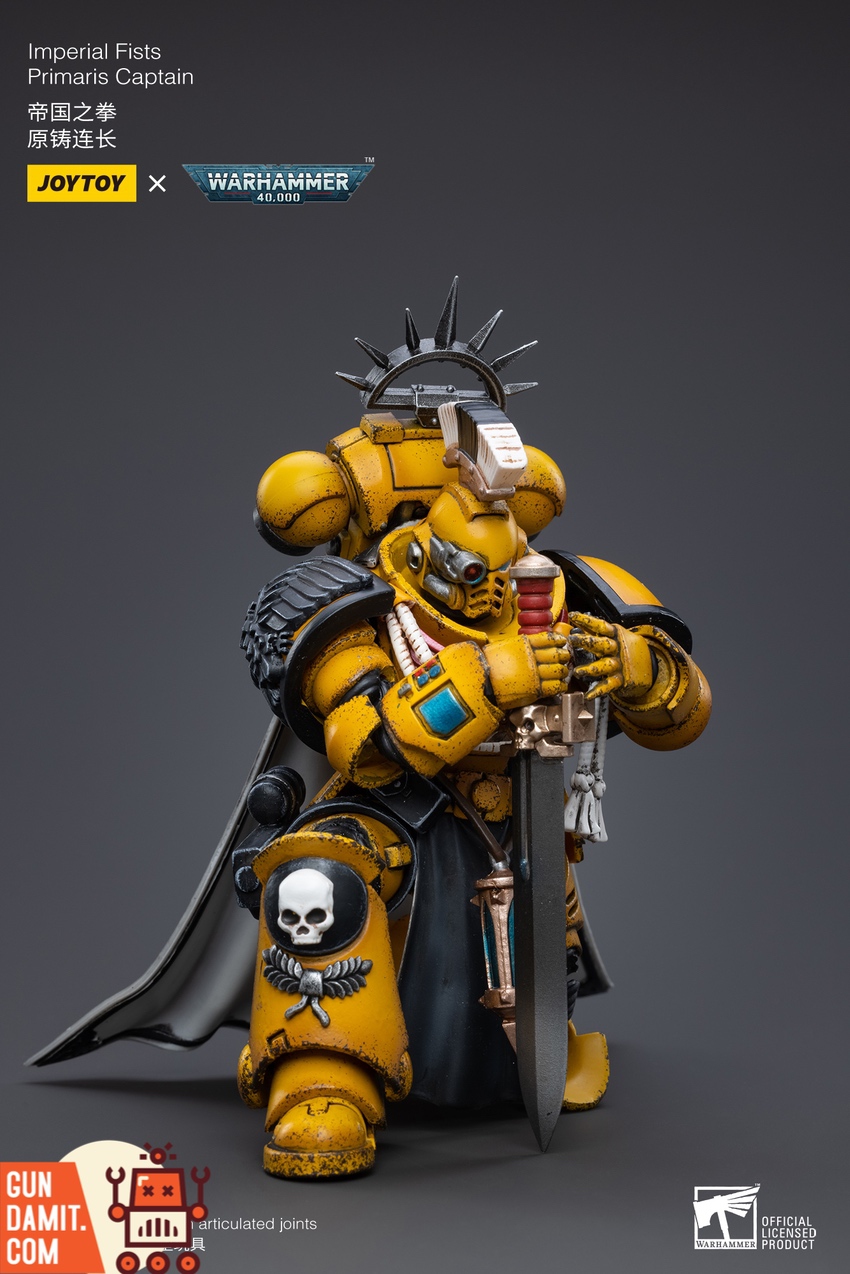 JoyToy WH40K Imperial Fists Captain close-up on ornate helmet and chest details JoyToy WH40K Imperial Fists Captain close-up on ornate helmet and chest details