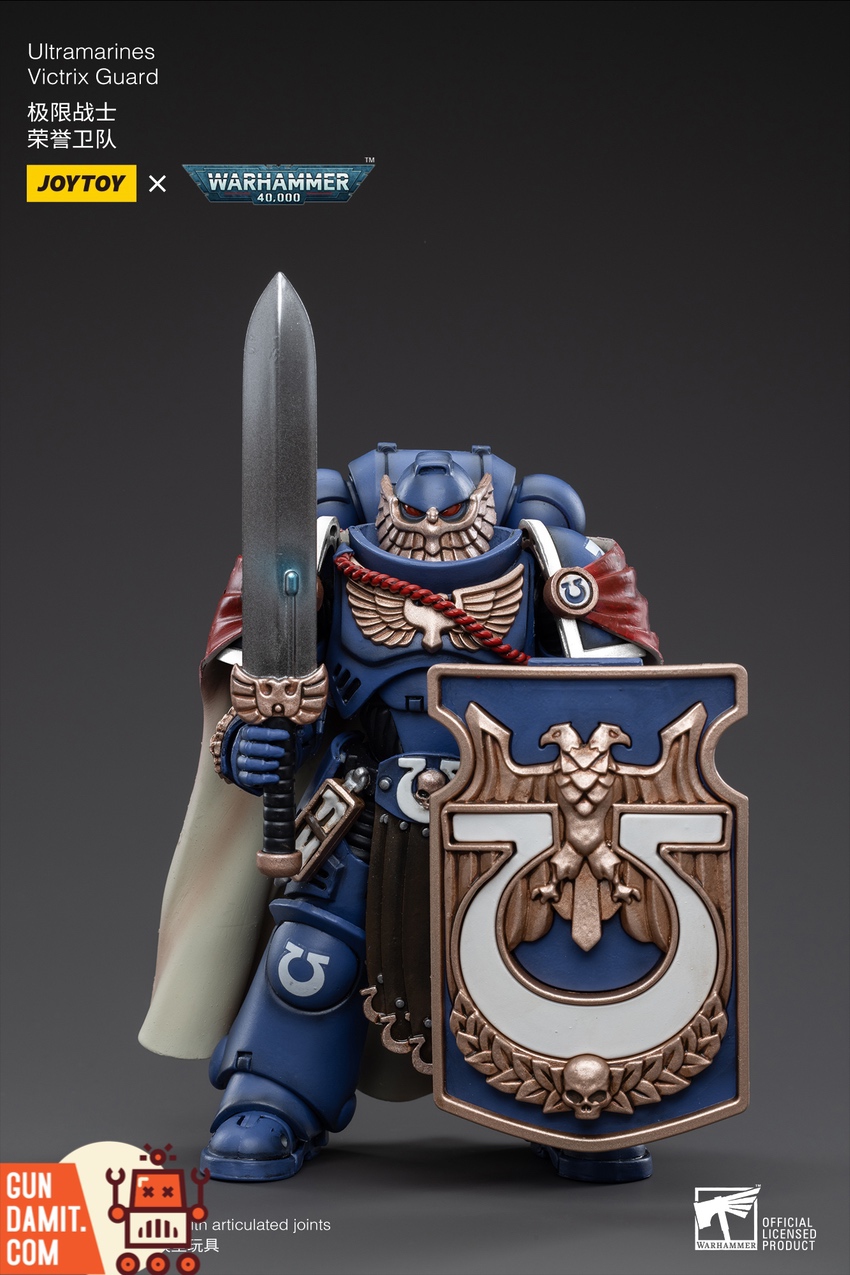 JoyToy JT3587 Ultramarines Victrix Guard front view with eagle shield and power sword JoyToy JT3587 Ultramarines Victrix Guard front view with eagle shield and power sword