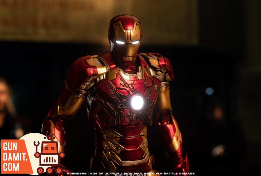 Threezero Iron Man Mark 43 Battle Damaged dynamic pose with repulsor blast effects Threezero Iron Man Mark 43 Battle Damaged dynamic pose with repulsor blast effects