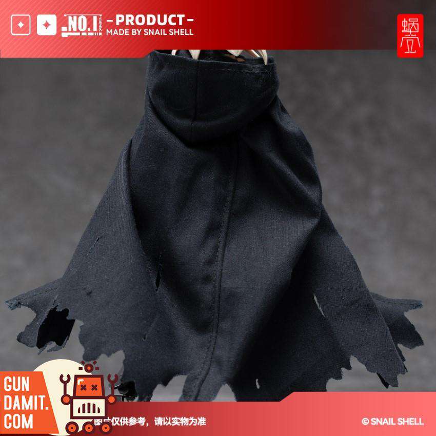 Black hooded cape laid flat showing torn edge detail Black hooded cape laid flat showing torn edge detail