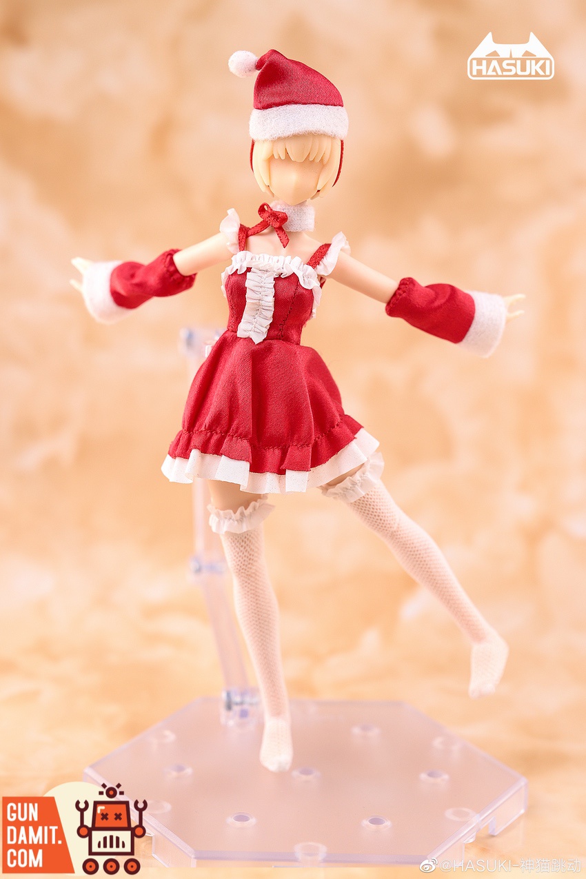 HASUKI 1/12 CS003 Christmas clothing set on figure showing red Santa dress with hat and mittens HASUKI 1/12 CS003 Christmas clothing set on figure showing red Santa dress with hat and mittens
