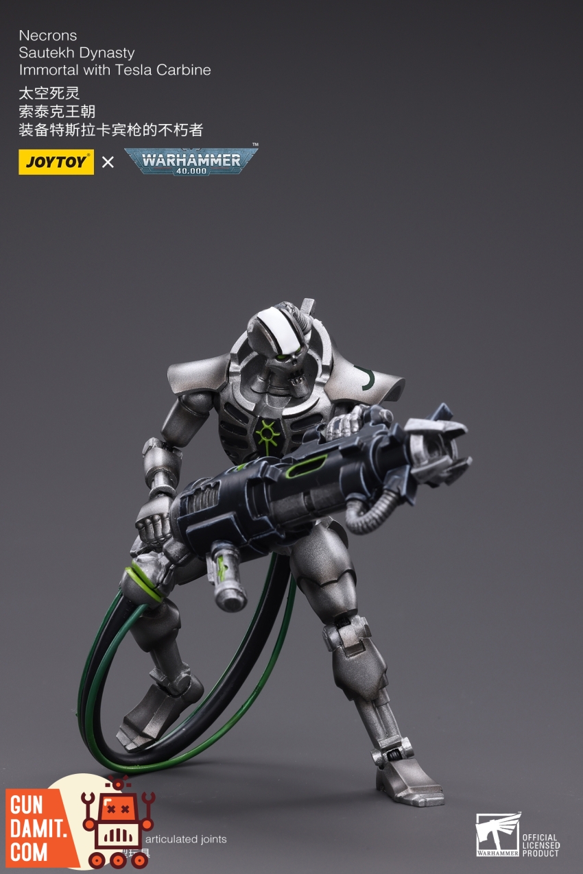 JoyToy 1/18 Warhammer 40K Necrons Sautekh Dynasty Immortal with Tesla Carbine front aiming pose JoyToy 1/18 Warhammer 40K Necrons Sautekh Dynasty Immortal with Tesla Carbine front aiming pose