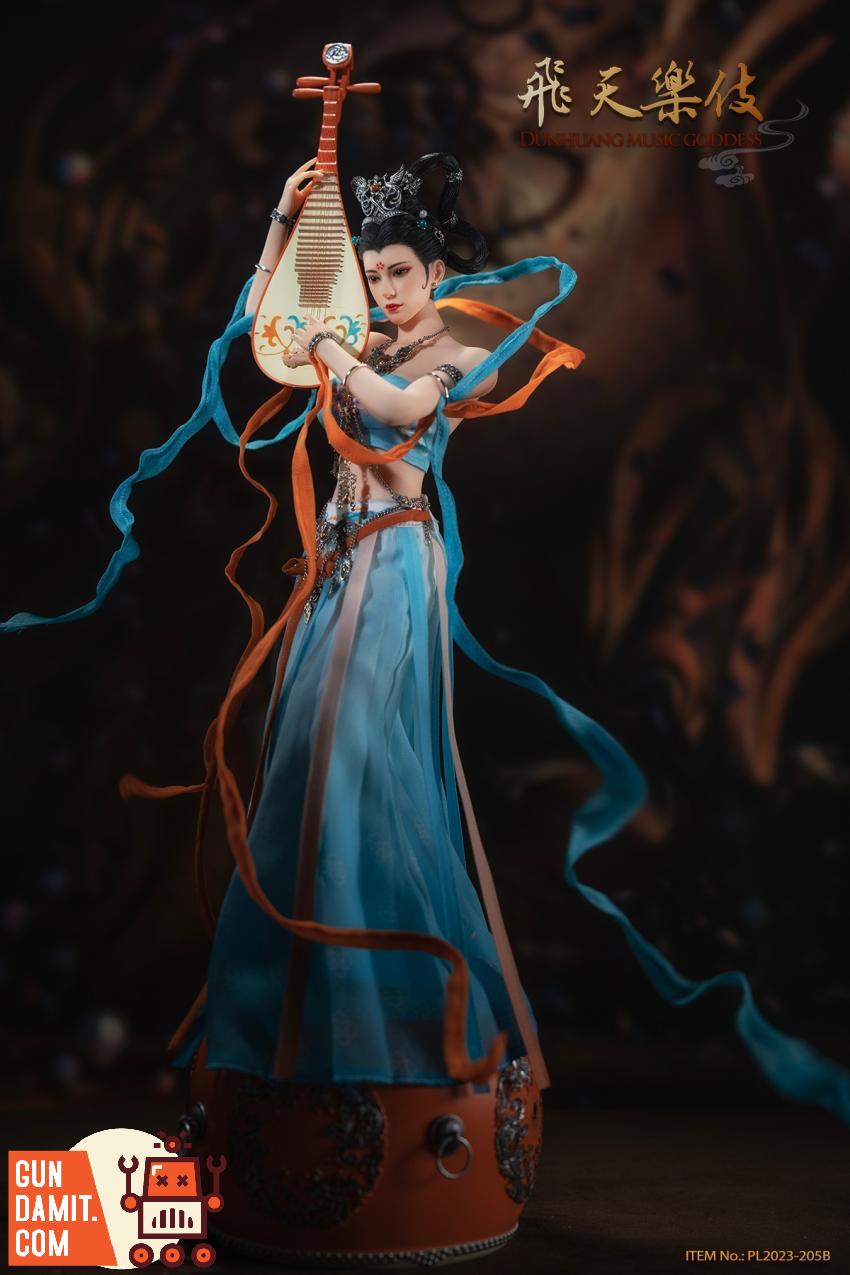 Blue version Music Goddess on orange drum display base Blue version Music Goddess on orange drum display base