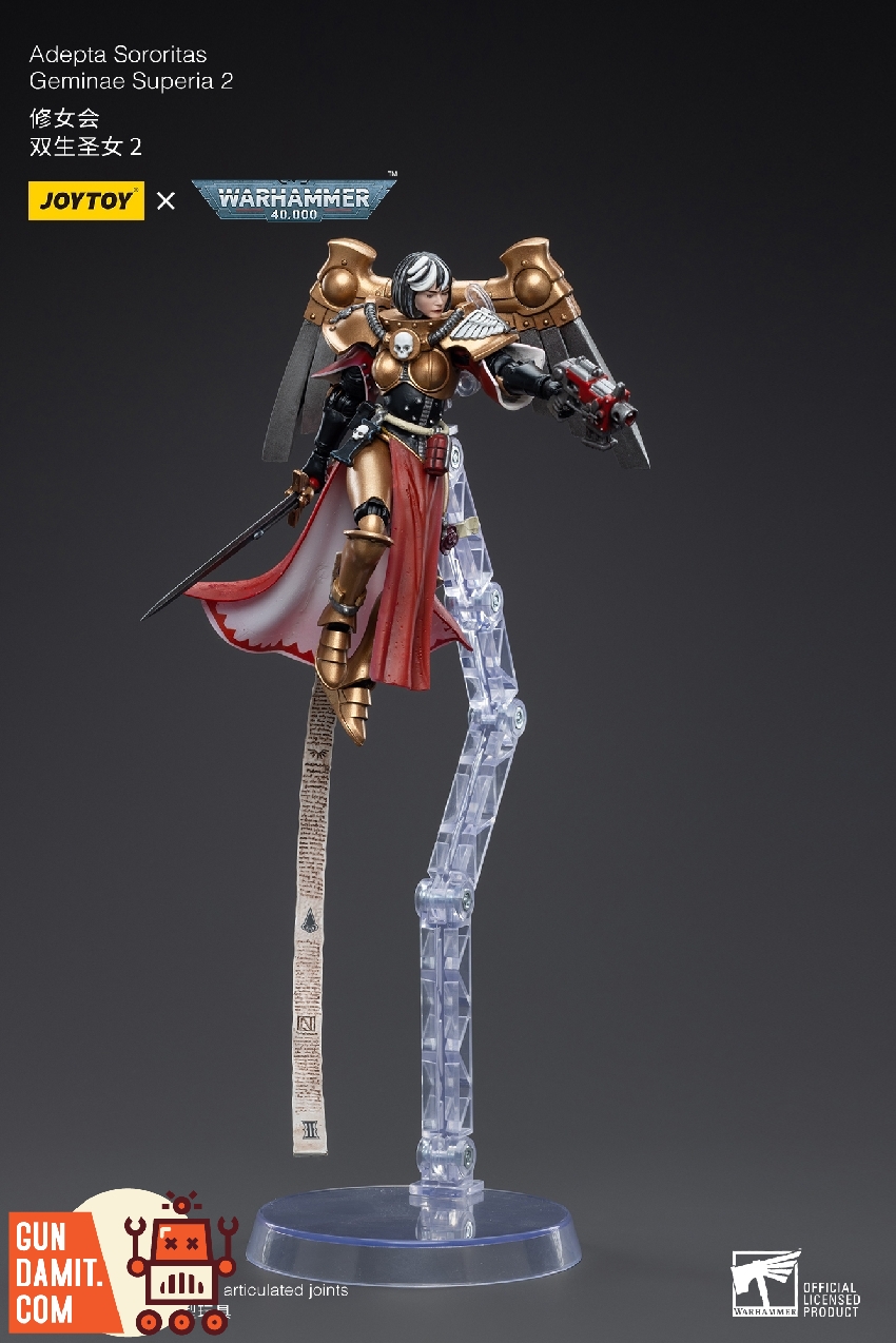 Geminae Superia 2 in flight pose with sword and bolt pistol on clear display stand with purity seal Geminae Superia 2 in flight pose with sword and bolt pistol on clear display stand with purity seal