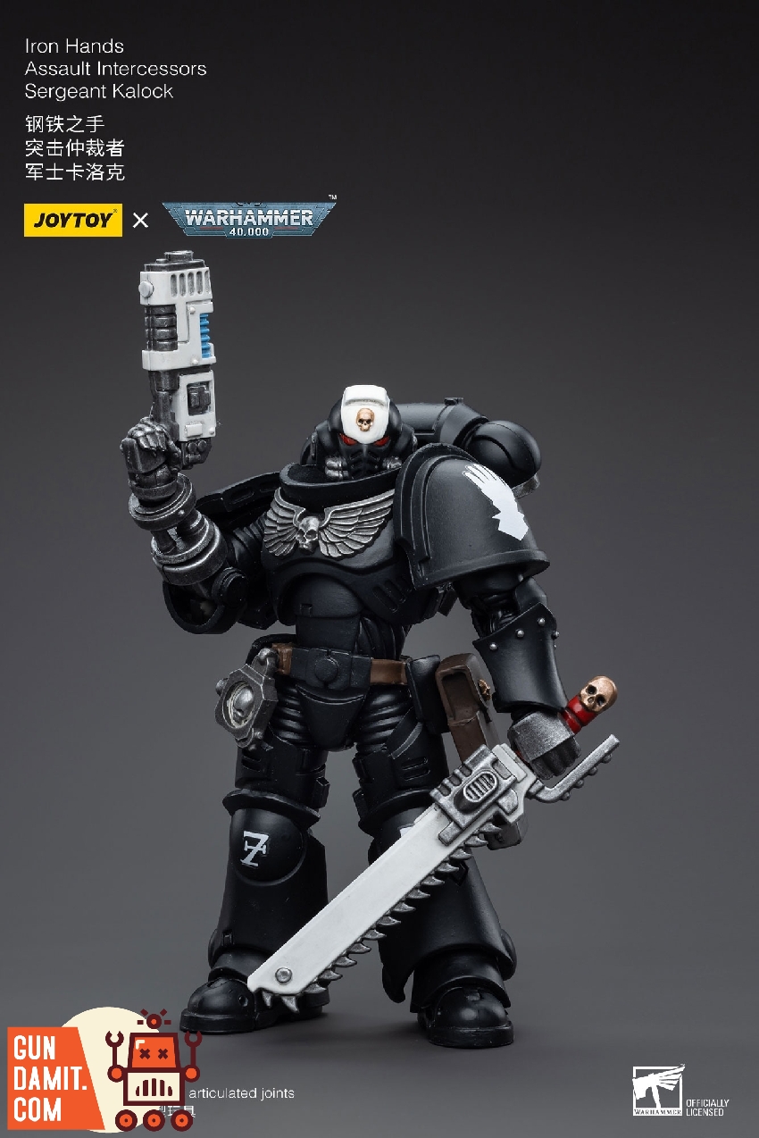 JoyToy 1/18 Iron Hands Sergeant Kalock in black power armor raising bolt pistol and holding chainsword JoyToy 1/18 Iron Hands Sergeant Kalock in black power armor raising bolt pistol and holding chainsword