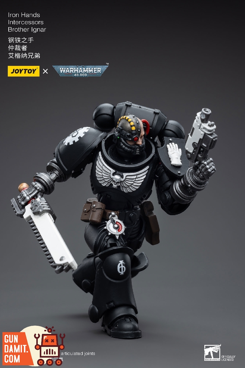 Brother Ignar charging forward with combat knife in right hand and bolt pistol raised in left hand Brother Ignar charging forward with combat knife in right hand and bolt pistol raised in left hand