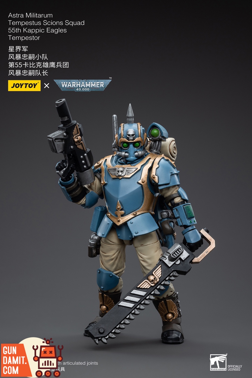 Tempestor holding hot-shot lasgun upright with chainsword at side in blue Kappic Eagles armor Tempestor holding hot-shot lasgun upright with chainsword at side in blue Kappic Eagles armor