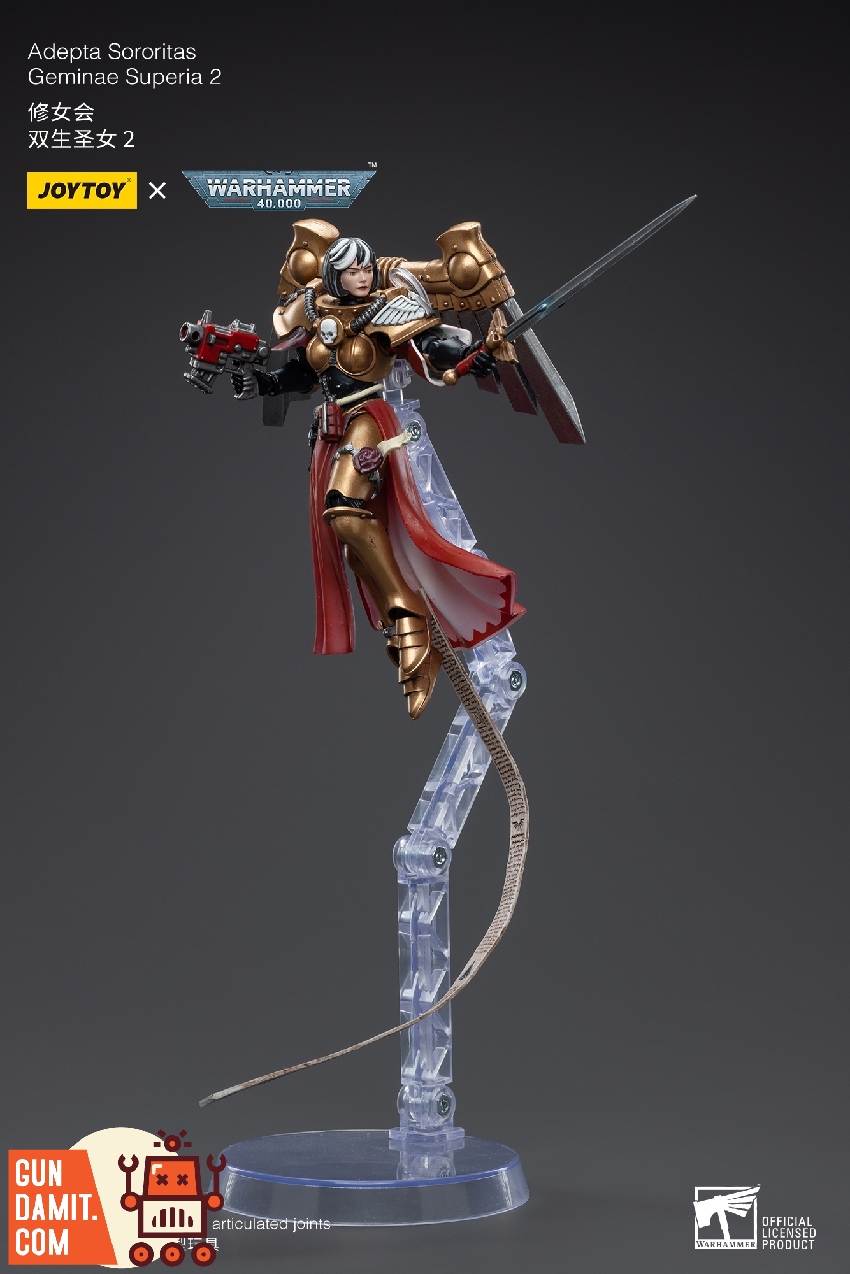 Geminae Superia 2 diving attack pose with sword and bolt pistol on transparent flight stand Geminae Superia 2 diving attack pose with sword and bolt pistol on transparent flight stand