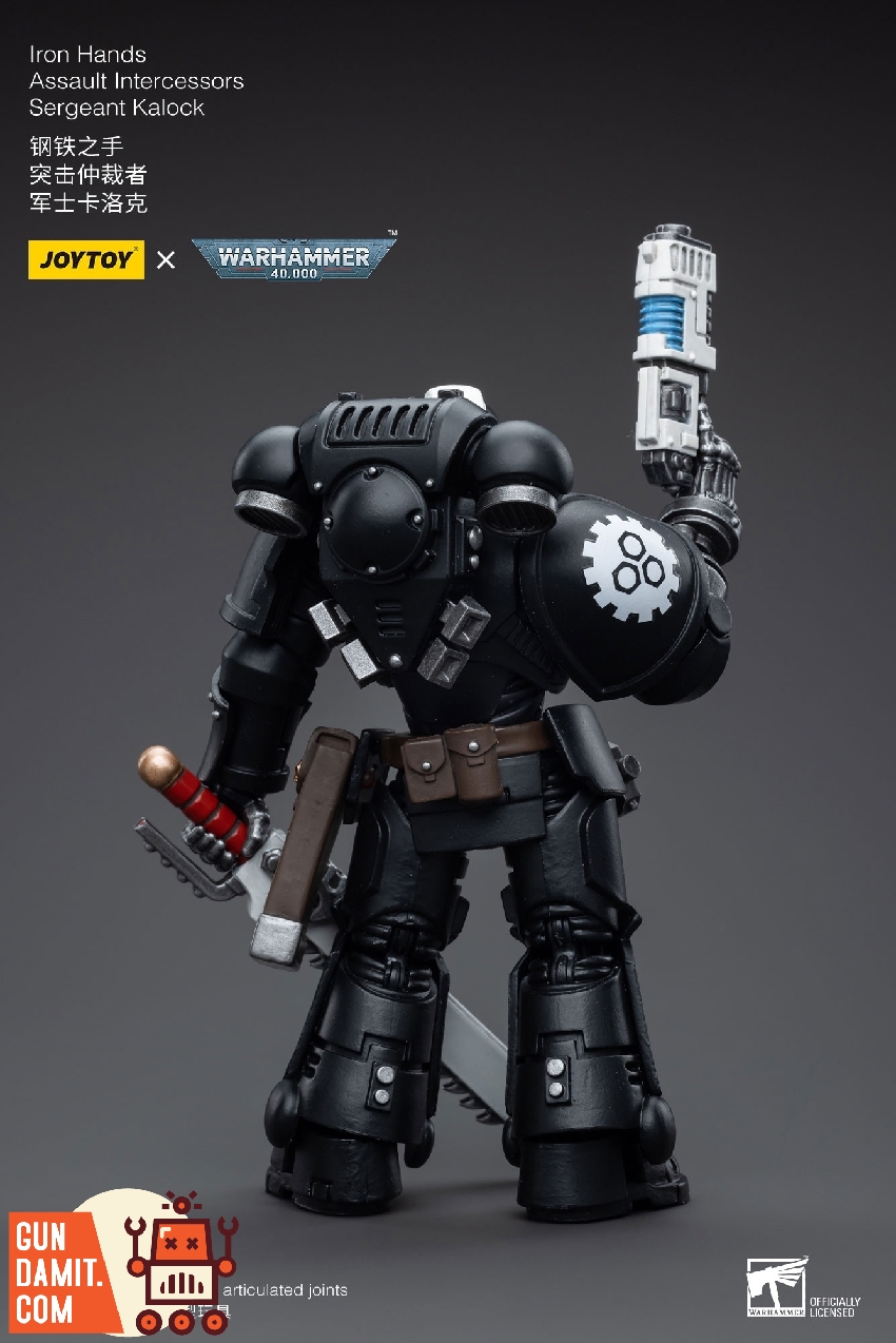 Rear three-quarter view of Sergeant Kalock raising bolt pistol with chainsword holstered and utility pouches visible Rear three-quarter view of Sergeant Kalock raising bolt pistol with chainsword holstered and utility pouches visible