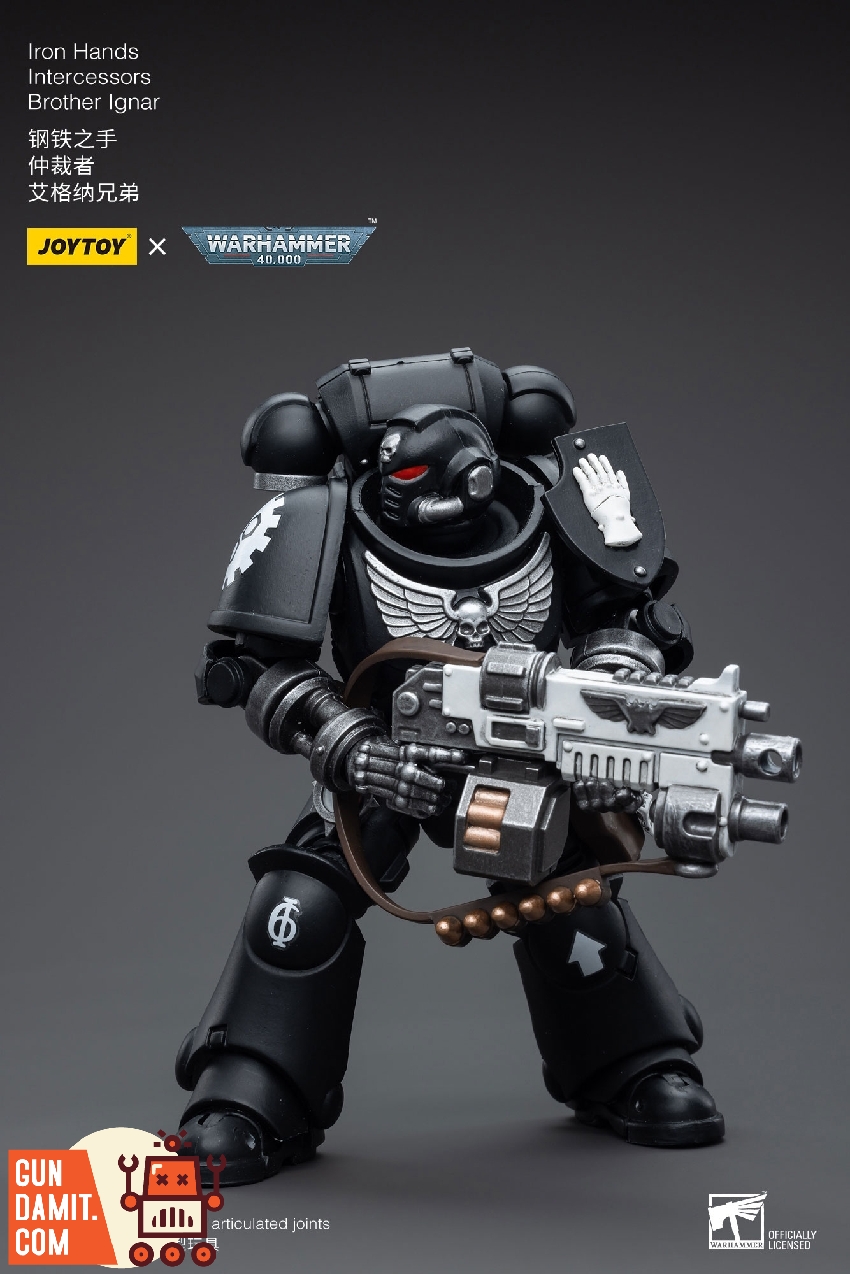 Iron Hands Intercessor Brother Ignar in full black power armor with helmet holding bolt rifle at ready Iron Hands Intercessor Brother Ignar in full black power armor with helmet holding bolt rifle at ready