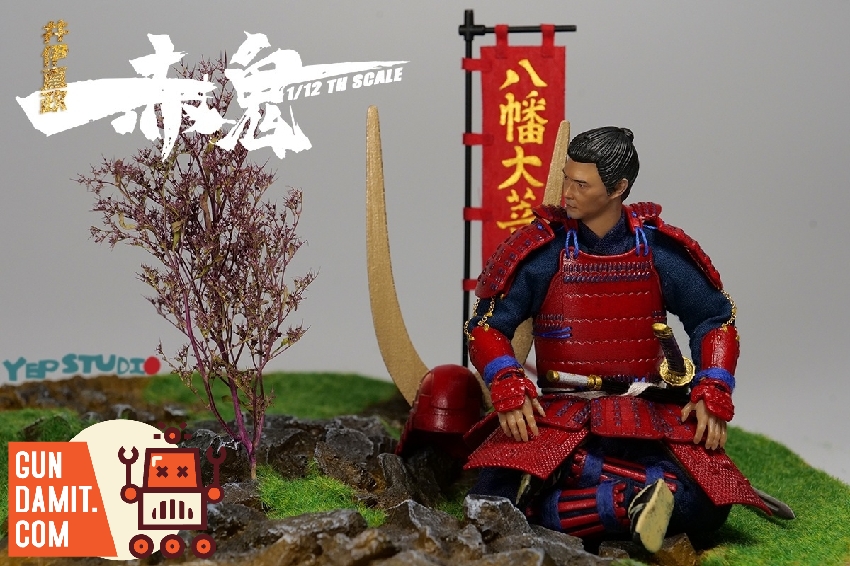 Naomasa figure seated without helmet on battlefield diorama with cherry blossom tree and war banner Naomasa figure seated without helmet on battlefield diorama with cherry blossom tree and war banner