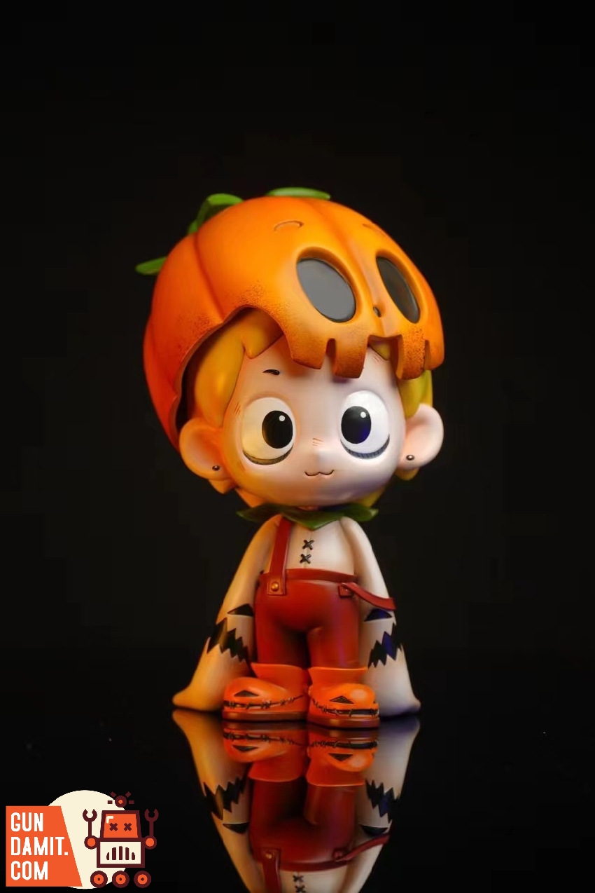 Original Dico figure wearing pumpkin skull hat with full body three-quarter view Original Dico figure wearing pumpkin skull hat with full body three-quarter view
