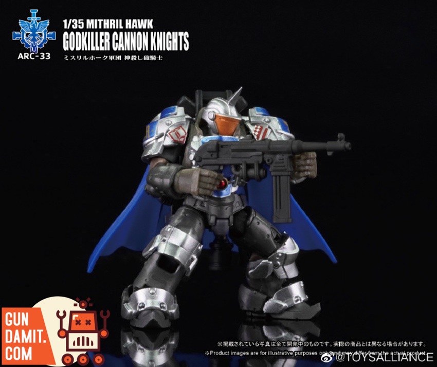 Godkiller Cannon Knight in standing combat stance holding assault rifle with blue cape Godkiller Cannon Knight in standing combat stance holding assault rifle with blue cape