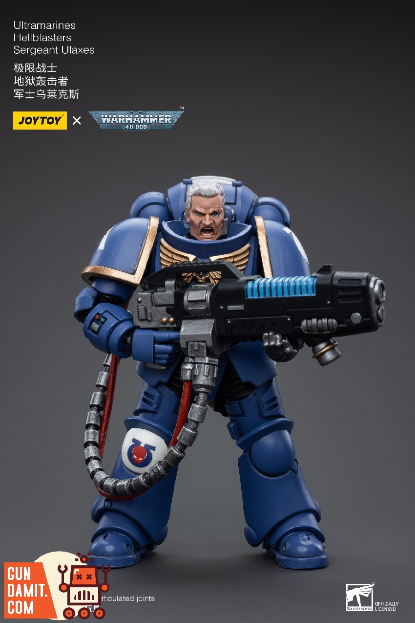 Sergeant Ulaxes rear view in blue power armor showing backpack and red cable connections Sergeant Ulaxes rear view in blue power armor showing backpack and red cable connections