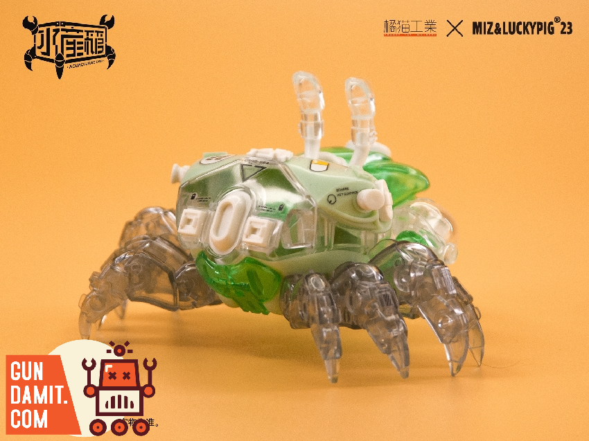 Orange Cat Fiddler Crab model in mint green translucent shell with mechanical legs on white background Orange Cat Fiddler Crab model in mint green translucent shell with mechanical legs on white background