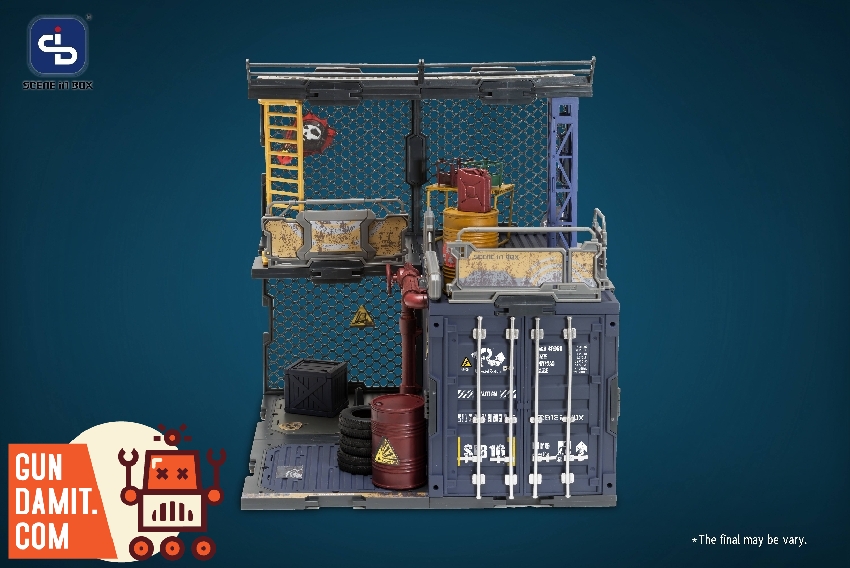 Front view of Container Warehouse diorama with tires oil drum and chain-link backdrop with yellow ladder Front view of Container Warehouse diorama with tires oil drum and chain-link backdrop with yellow ladder