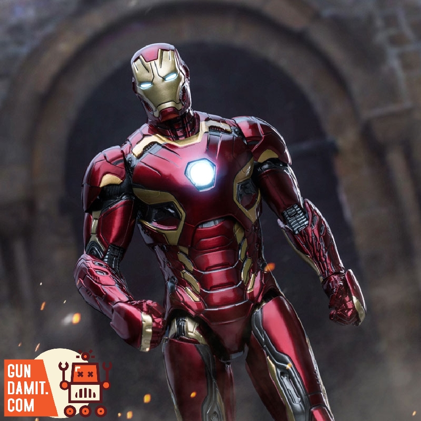 Iron Man Mark 45 close-up showing metallic red and gold armor face plate with glowing arc reactor Iron Man Mark 45 close-up showing metallic red and gold armor face plate with glowing arc reactor