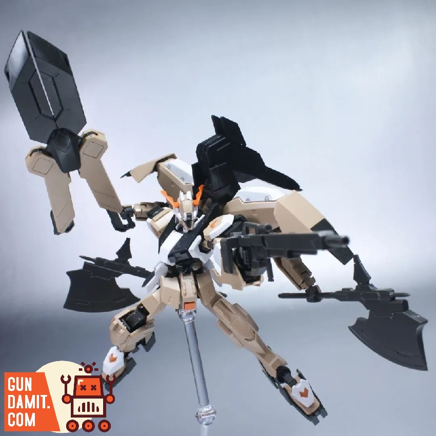 HG IBO Gundam equipped with TX weapons kit in dynamic aerial pose wielding large mace with wing binders HG IBO Gundam equipped with TX weapons kit in dynamic aerial pose wielding large mace with wing binders