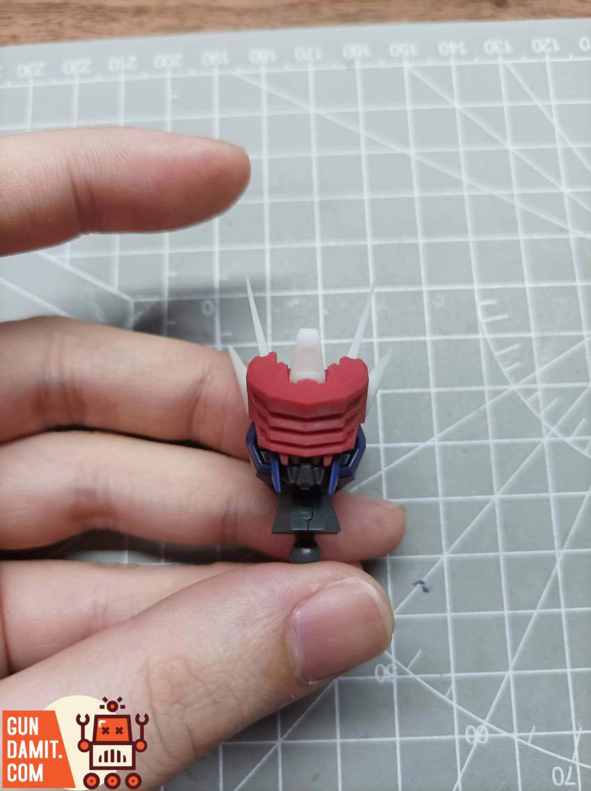 Side view of upgrade mask installed on model kit head showing improved antenna and visor proportion Side view of upgrade mask installed on model kit head showing improved antenna and visor proportion