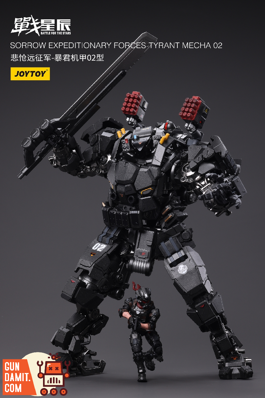 Rear view of Tyrant Mecha 02 with pilot figure showing heavy back-mounted weapons and armor Rear view of Tyrant Mecha 02 with pilot figure showing heavy back-mounted weapons and armor