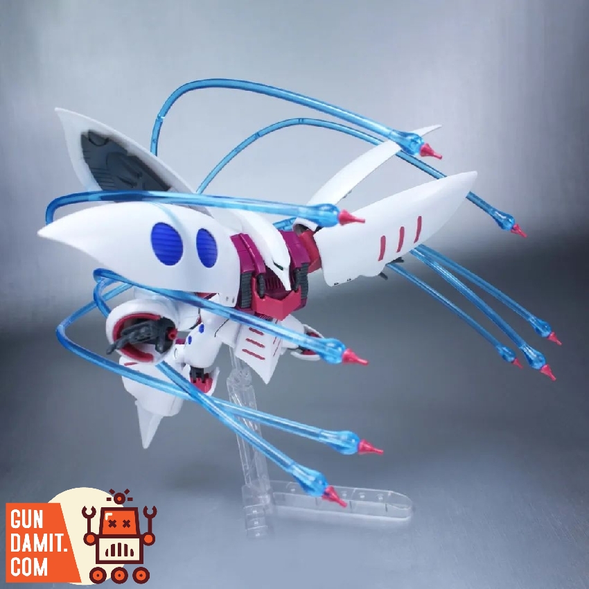 Side view of Qubeley with multiple translucent blue funnel beam effects radiating from shoulder binders Side view of Qubeley with multiple translucent blue funnel beam effects radiating from shoulder binders