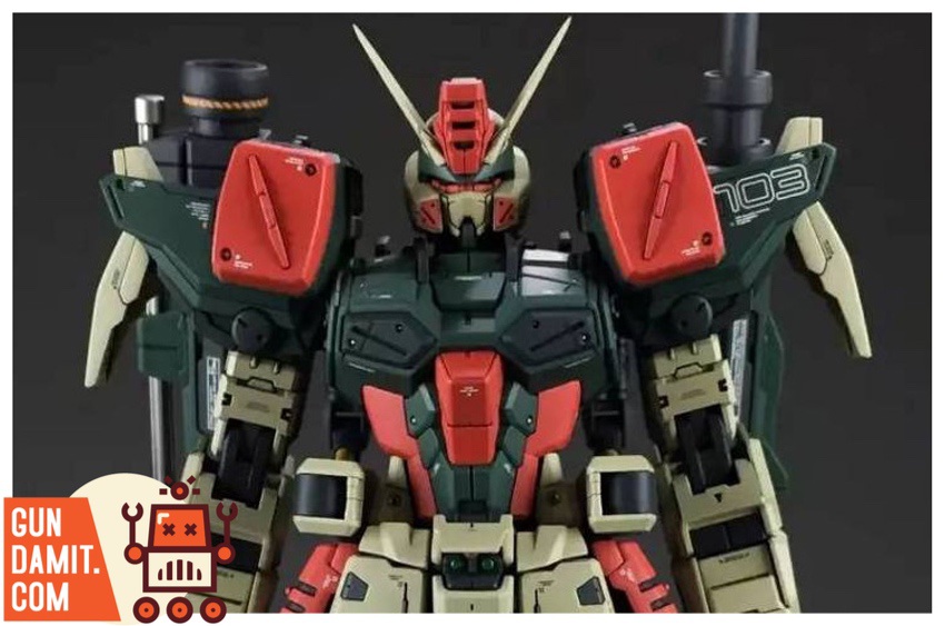 Close-up of Buster Gundam upper body showing V-fin head unit and detailed red shoulder armor panels Close-up of Buster Gundam upper body showing V-fin head unit and detailed red shoulder armor panels