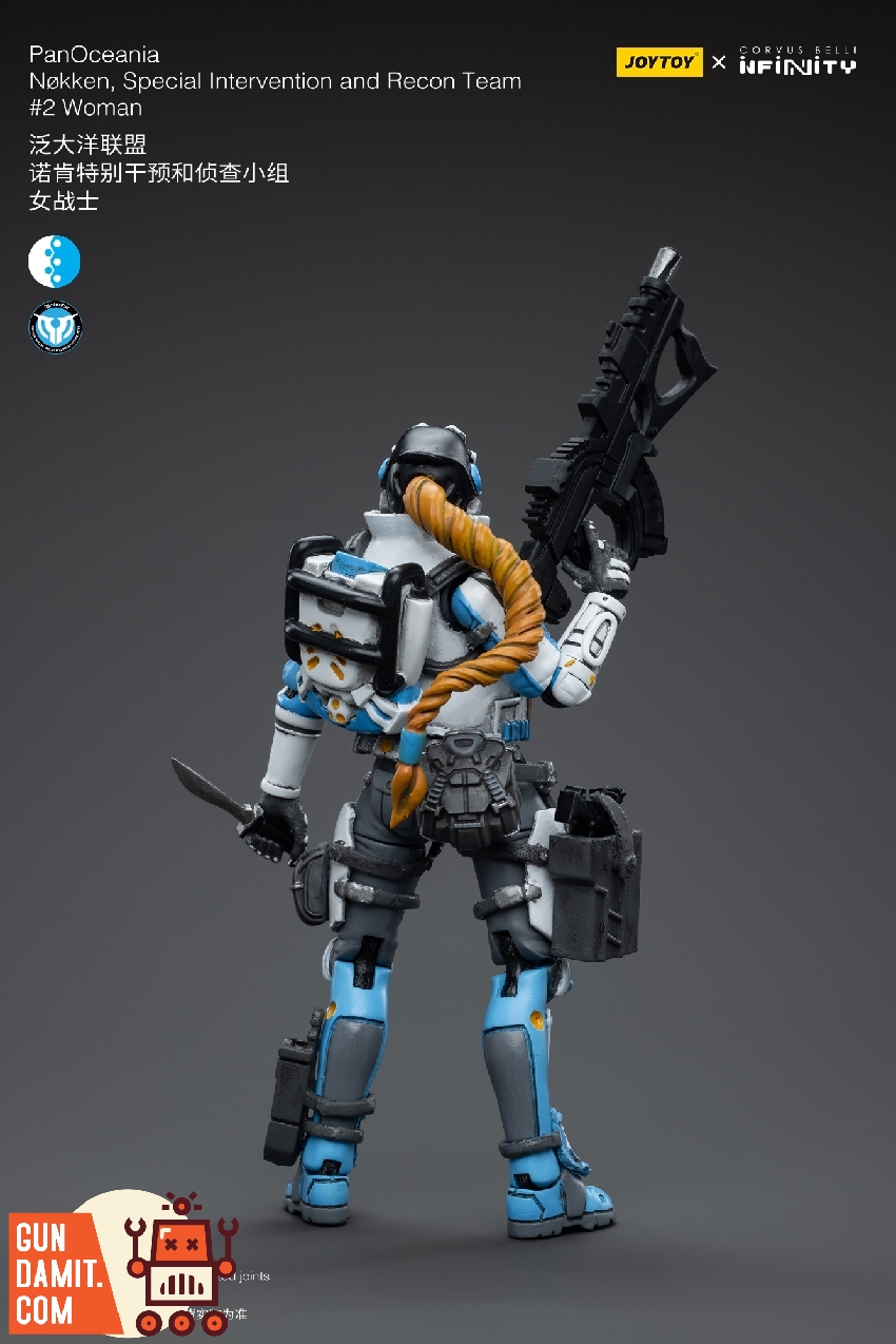 Nokken female operative aiming rifle with white fox-like helmet visor and blue combat armor Nokken female operative aiming rifle with white fox-like helmet visor and blue combat armor